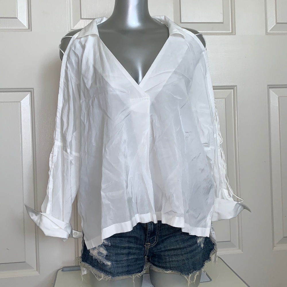 White open criss cross arm flowy this long sleeve top